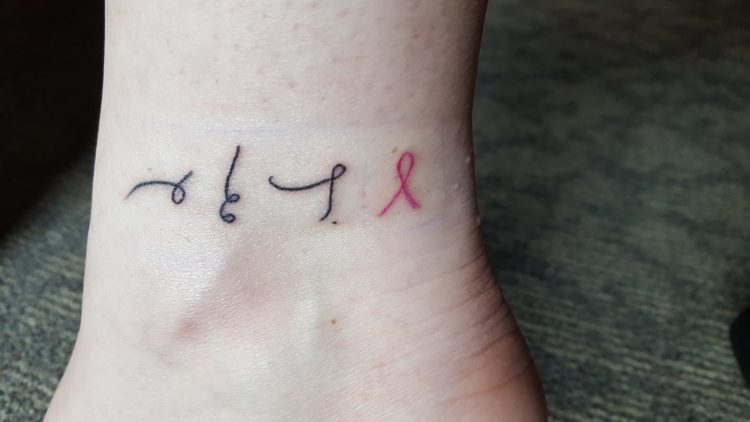 shorthand that says get busy living and breast cancer awareness ribbon