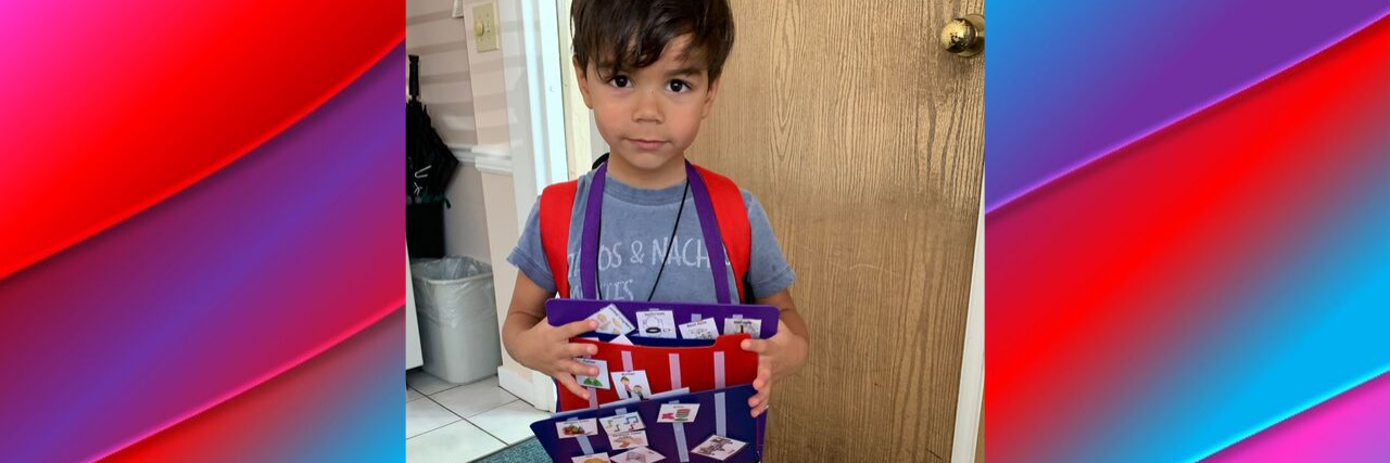 Finding the Right Preschool for a Child With Autism Diana's son with his communication board.