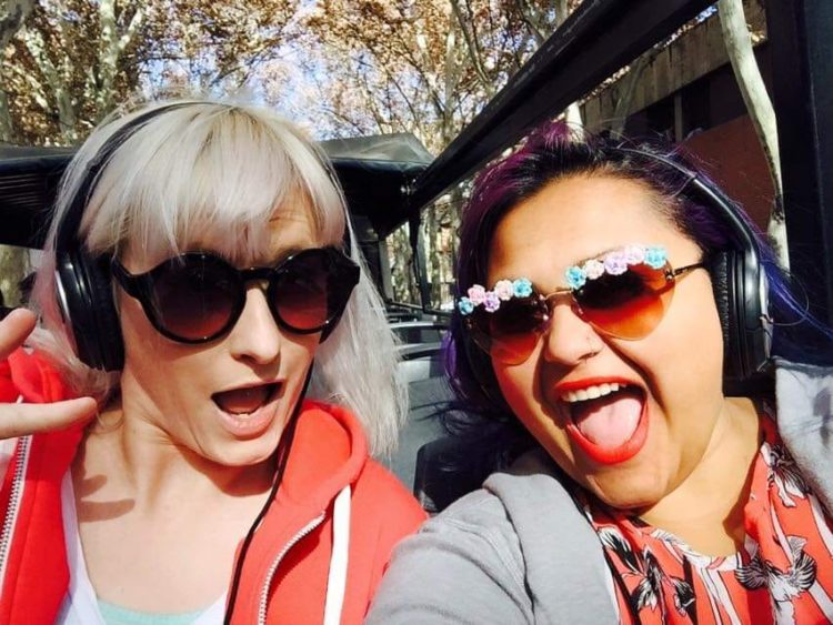 Selfie of two friends wearing sunglasses