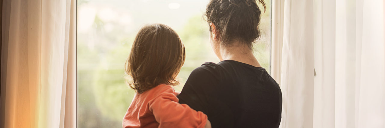 Tips to Cope With Helplessness as the Parent of a Kid With Disability Mother and son looking out of window