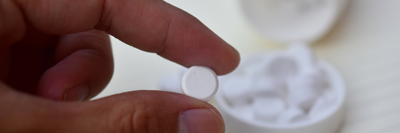 U.K. Study Shows Antidepressant Improves Anxiety More Than Depression White pills placed on the table