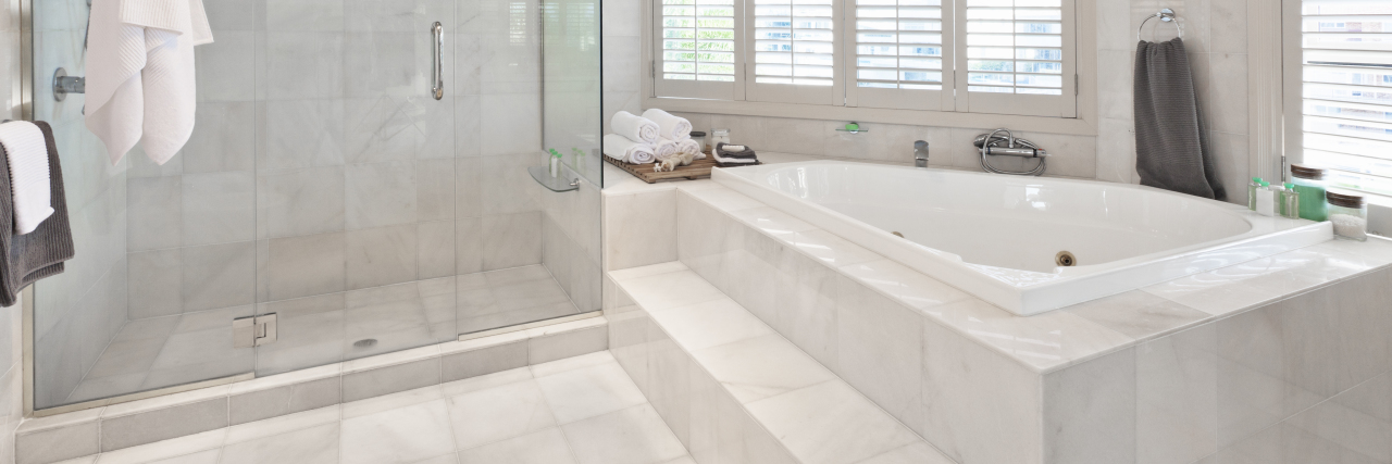 When 'Accessible' Doesn't Mean Accessible for All Marble tub with steps.