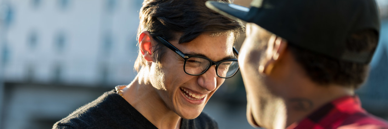Finding Supportive Friends Who Understand Your Autism Two male friends shaking hands.