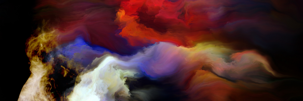 The Stigma and Misunderstanding Surrounding ME/CFS image of woman's face with bursts of colors coming through it