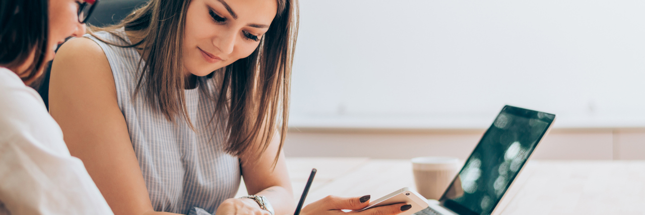 How to Find a Career Counselor Near Me Two female colleagues in office working together.