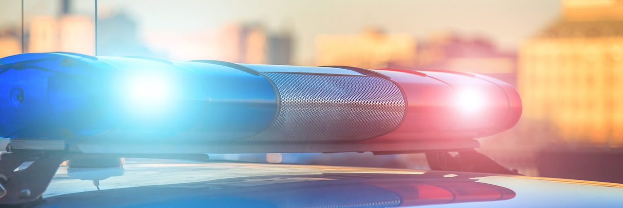 Woman Allegedly Kills Disabled Grandson, Fear He Wouldn't Have Support police car on the street close up