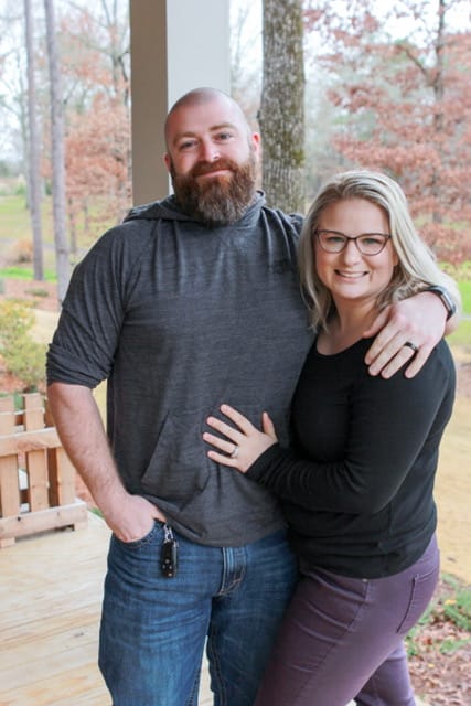 Couple posing for Christmas photo