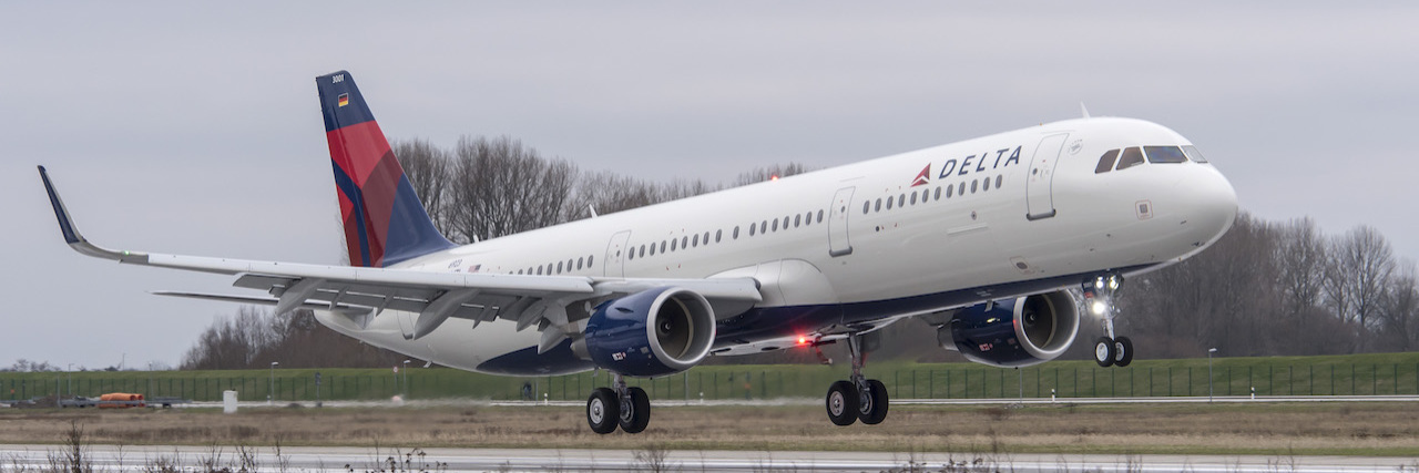 Disability Advocates Slam Delta's Ad Featuring Wheelchair-Using Kids Delta-branded plane nearing the runway