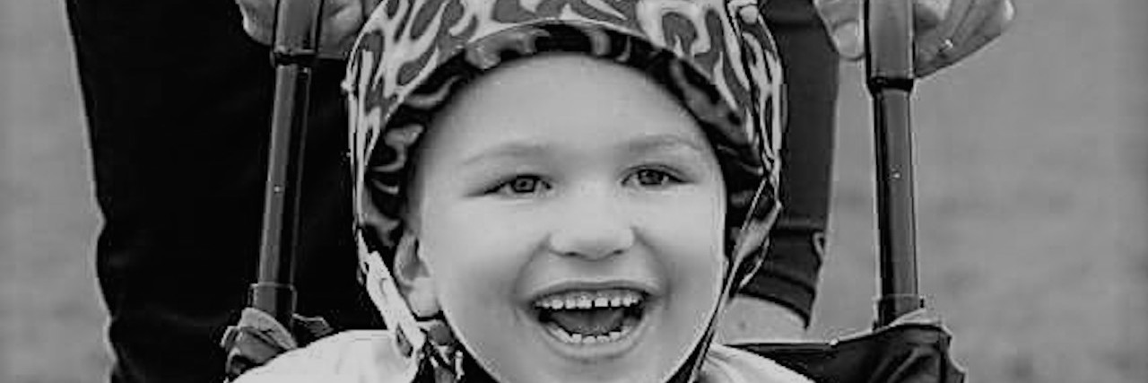 The 'Invisibility Superpower' of My Child's Wheelchair When He's Out in Public Sam in his wheelchair, smiling