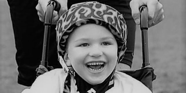 The 'Invisibility Superpower' of My Child's Wheelchair When He's Out in Public Sam in his wheelchair, smiling