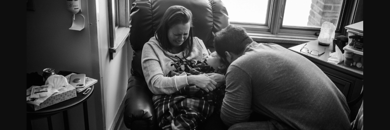 Missing a Lifetime of Firsts After Losing a Child Mother and father crying and holding their child