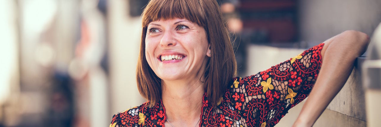 What I Wish I Knew When I Was Diagnosed With Parkinson's A woman smiling