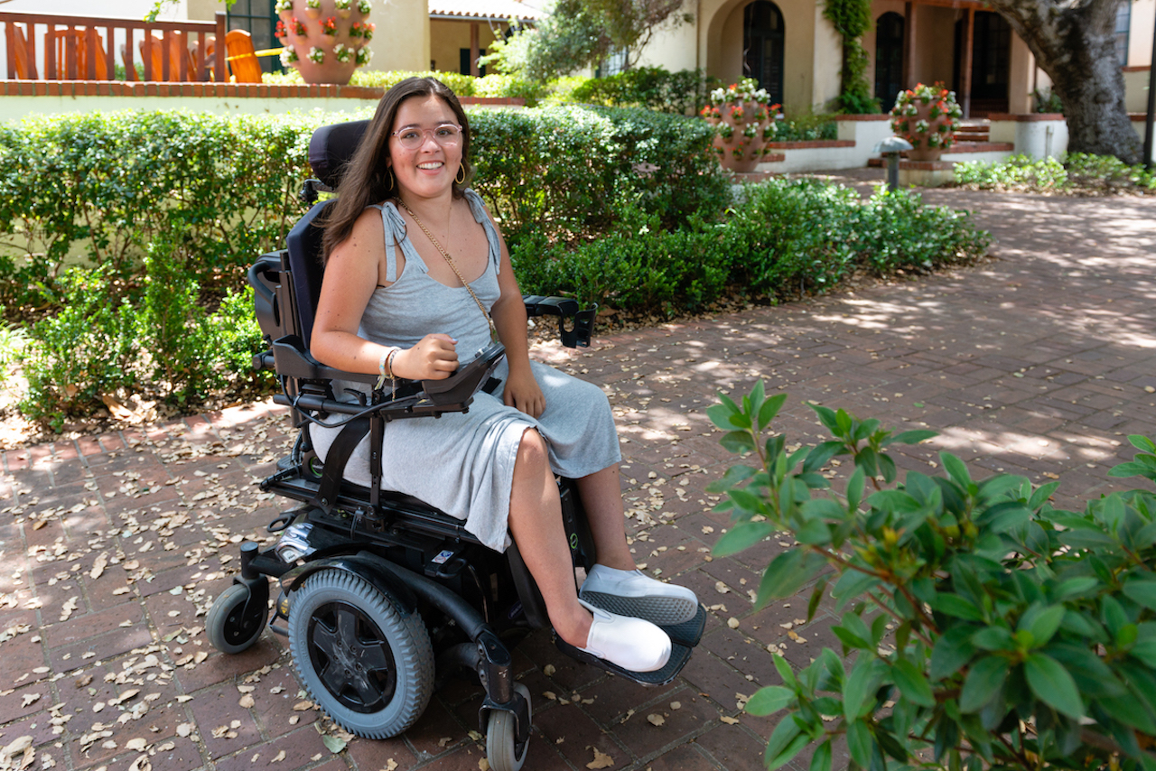 Sylvia Colt-Lacayo has a neuromuscular disease and needs help from a caregiver to perform certain daily functions. (Heidi de Marco/KHN)