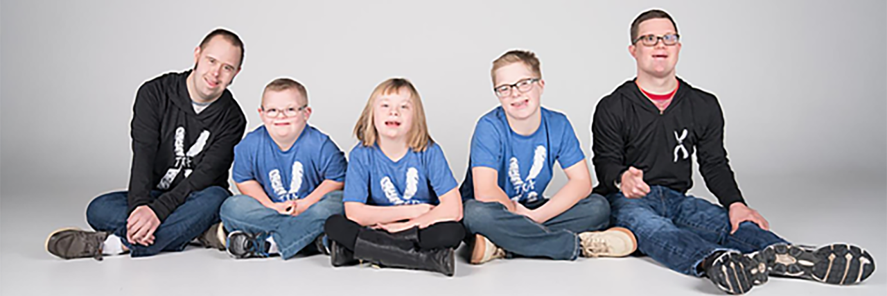 People with Down syndrome modeling Xtra Apparel.