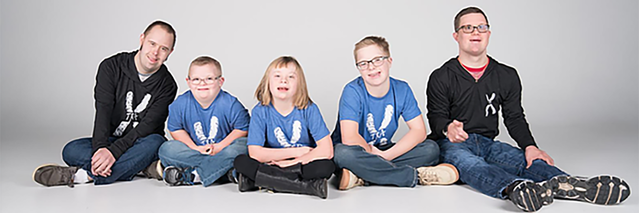 Having Down Syndrome Isn't Sad People with Down syndrome modeling Xtra Apparel.