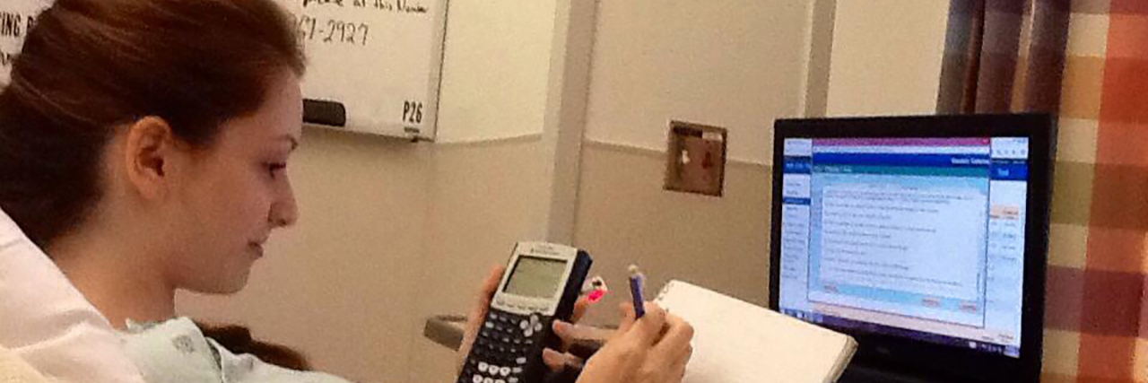 Feeling Pressure to Be 'Productive' With Chronic Illness or Disability Cassidy doing homework from her hospital bed.