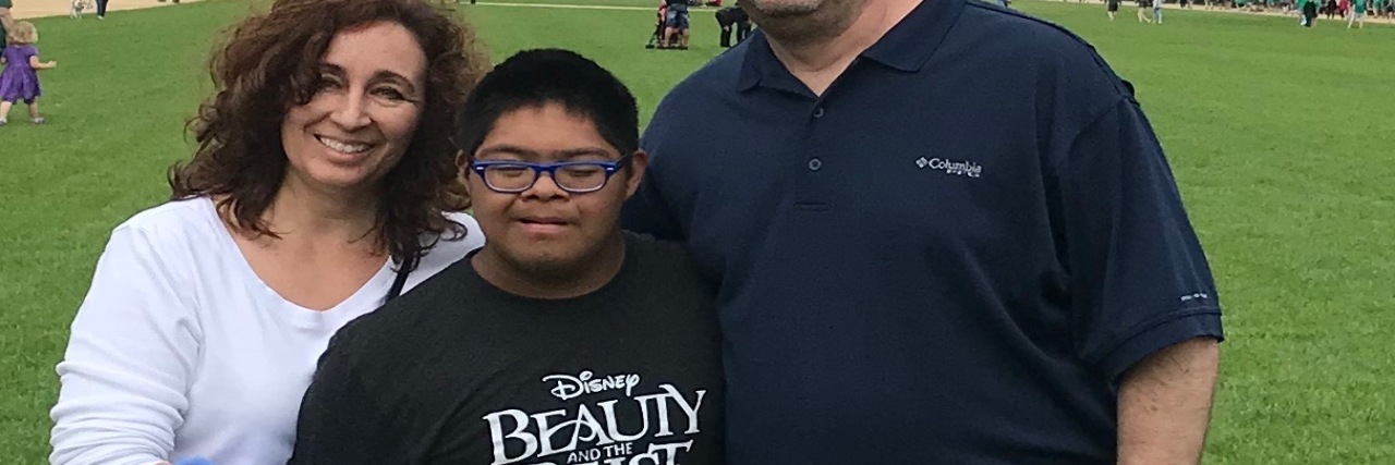 When a Parent of a Child With a Disability Has the Courage to Stand Up a family posing for a photo