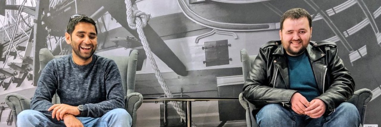 Animal Rights Advocate Berates Blind U.K. Man for Service Dog Dr. Amit Patel and Jonathan Attenborough with their service dogs on the floor in front of them