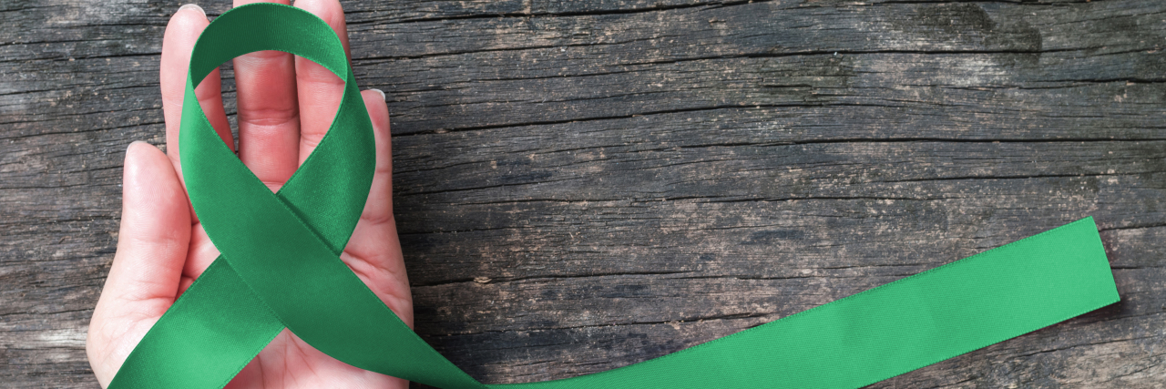 Why World CP Day and Disability Awareness Month Are Important Cerebral palsy awareness ribbon.