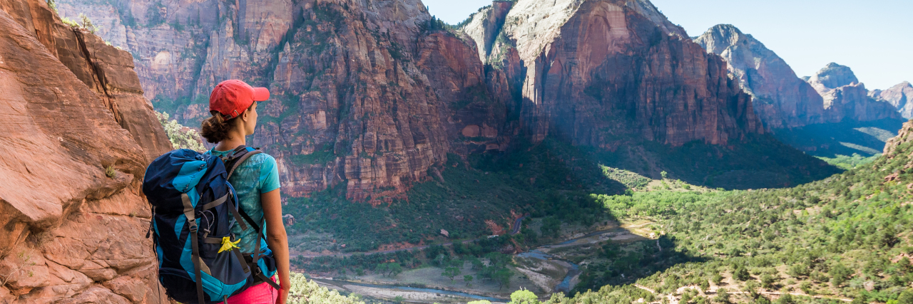 Woman hiking in Zion National Park.