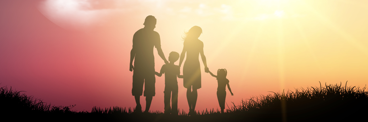 Learning to Speak Again After a Stroke Silhouette of a family walking against a sunset sky.