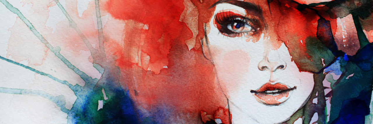 watercolor of a woman's face with red and blue and green colors surrounding