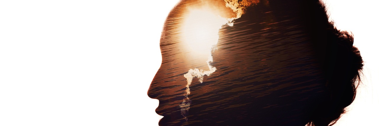Relating to Someone With Borderline Personality Disorder Silhouette of a woman's profile with sun behind the clouds
