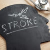 The word "stroke" written on a chalkboard head.