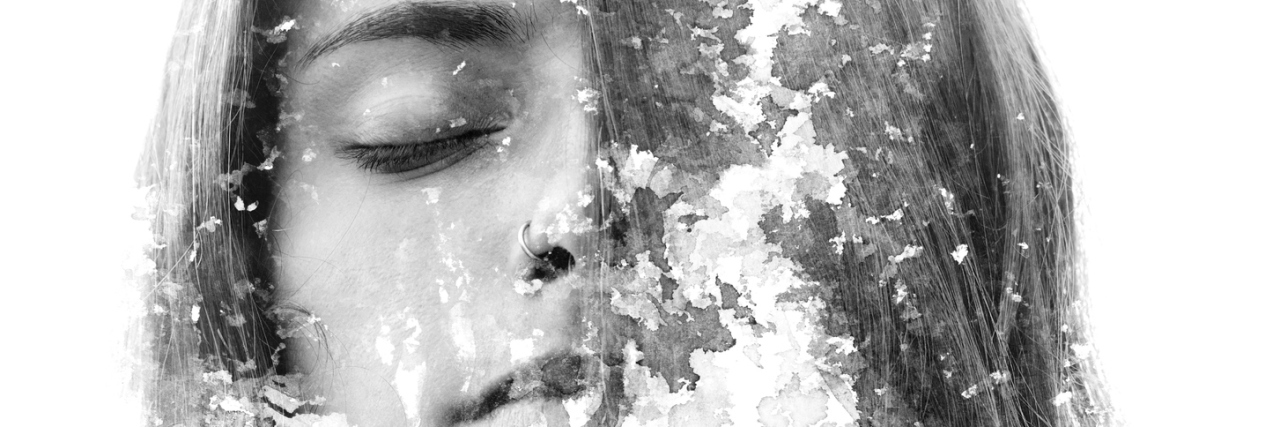 Wanting to Sabotage Relationship With Borderline Personality Disorder A photo of a woman with her eyes closed with a figure walking in the shadows.