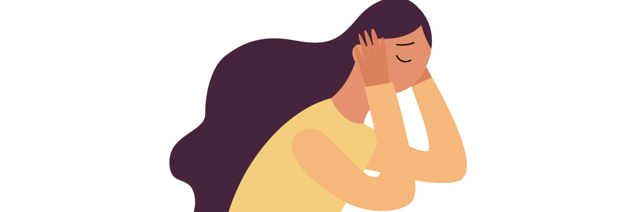 Things You Should Know About Endometriosis A woman lies balled up with her hands over her face.
