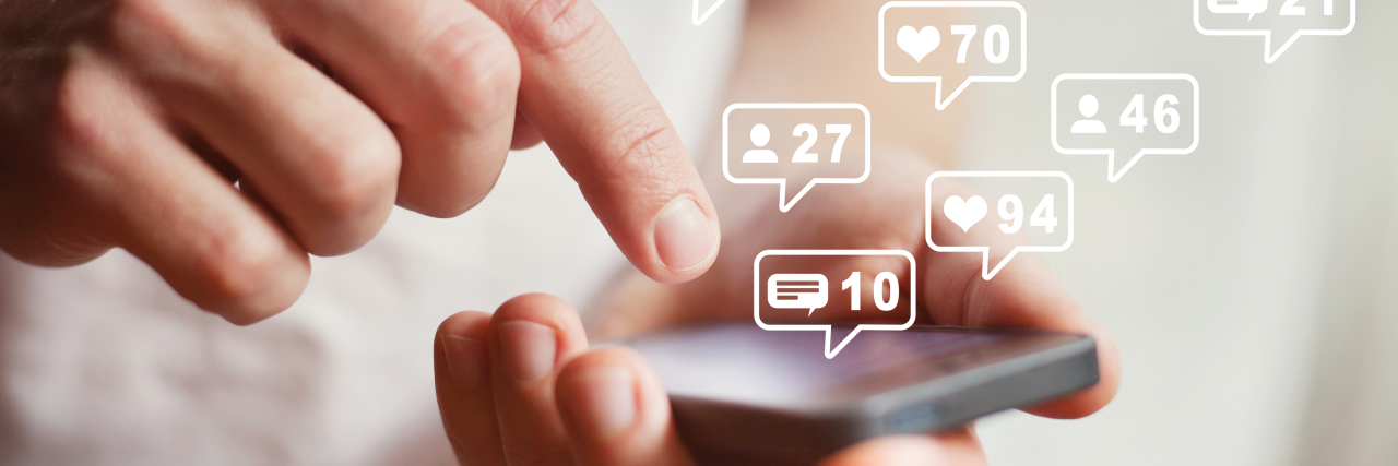 Keeping Teens With Disabilities Safe on Social Media Social media icons floating over phone.