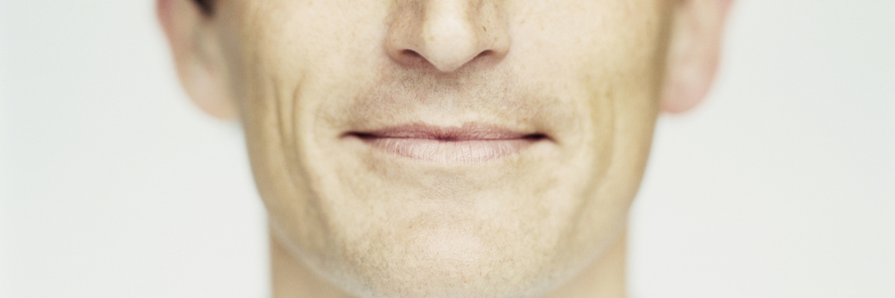 Close up of a man's mouth and nose