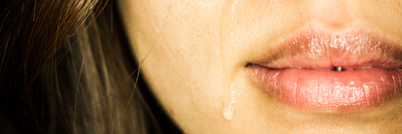 How It Feels When My Chronic Pain Is at a 'Worse Day' Level an asian woman crying