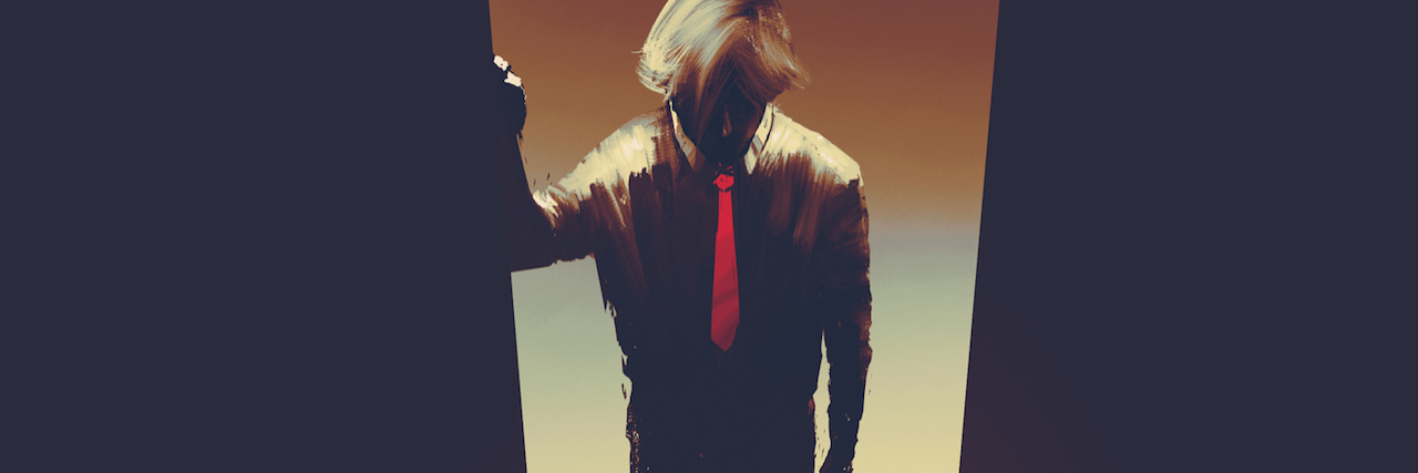 Questioning If You Still Have Bipolar Disorder After Recovery A man standing in a doorway. He's a dark figure with a red tie