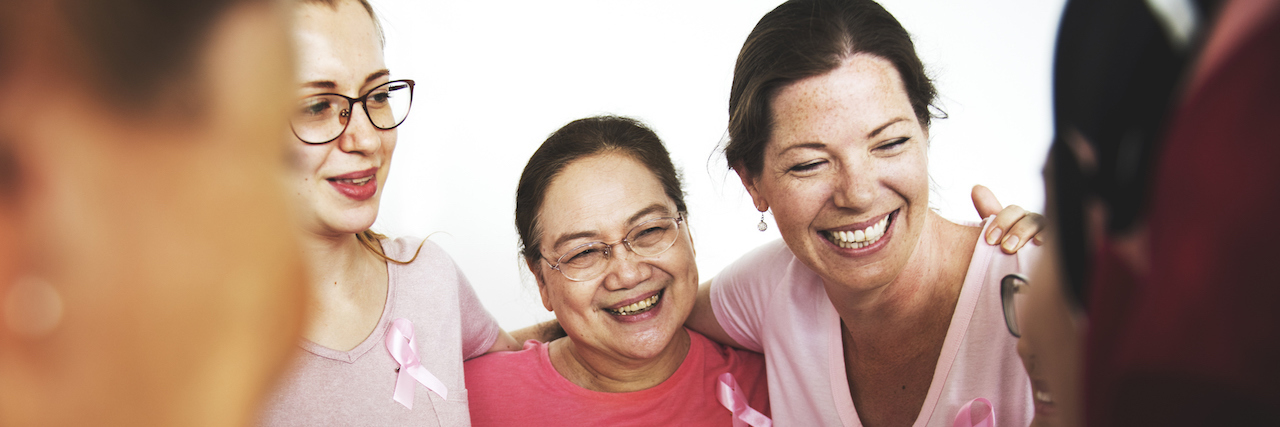 Even Though I Didn't Need Chemotherapy, Cancer Changed Me Group of Multiethnic Women Wear Pink Shirts and Ribbons