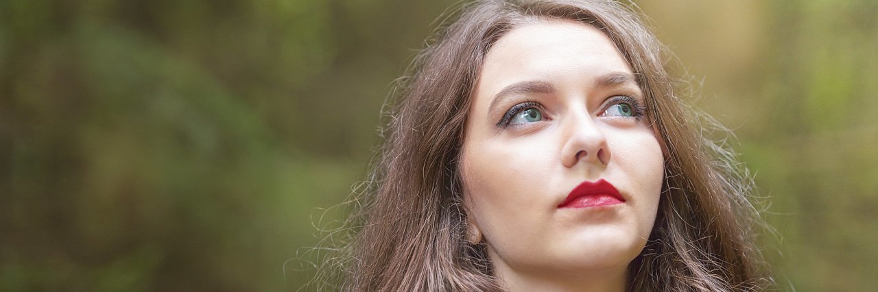 What Life Looks Like When You Have Seizures Every Day woman looking up towards sky