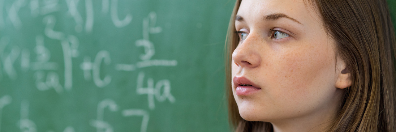 John Cornyn's RESPONSE Act Would Hurt Students Who Self-Harm A student standing in front of a chalk board