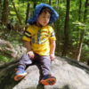Smriti's son playing in the woods.