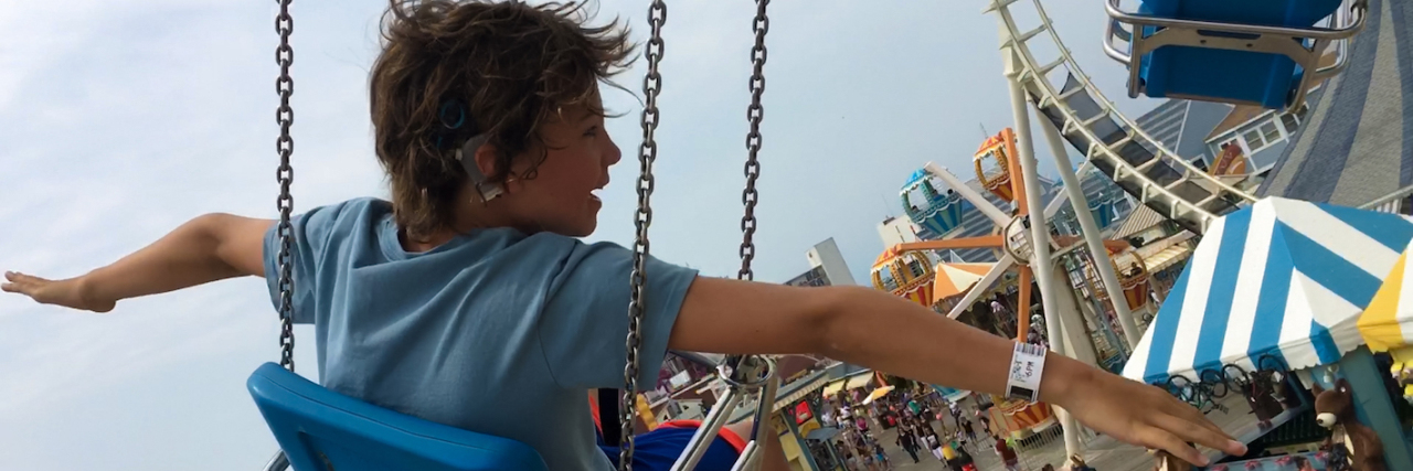 'Moonlight Sonata' Director Makes Film Accessible for Deaf People Jonas Brodsky on a swing with his arms out in "Moonlight Sonata"