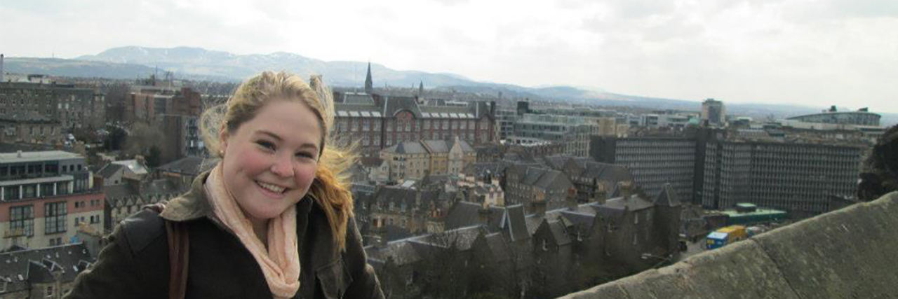 Succeeding at University With a Chronic Illness Maisy overlooking Edinburgh Scotland.
