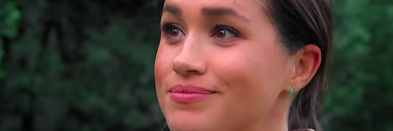 The Meaning Behind Meghan Markle's Stiff Upper Lip Comment