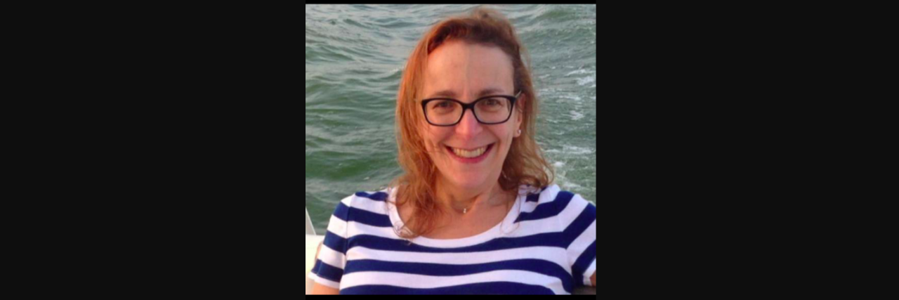My Journey to Find the Right Treatment for My Bipolar Disorder Photo of woman smiling at the camera