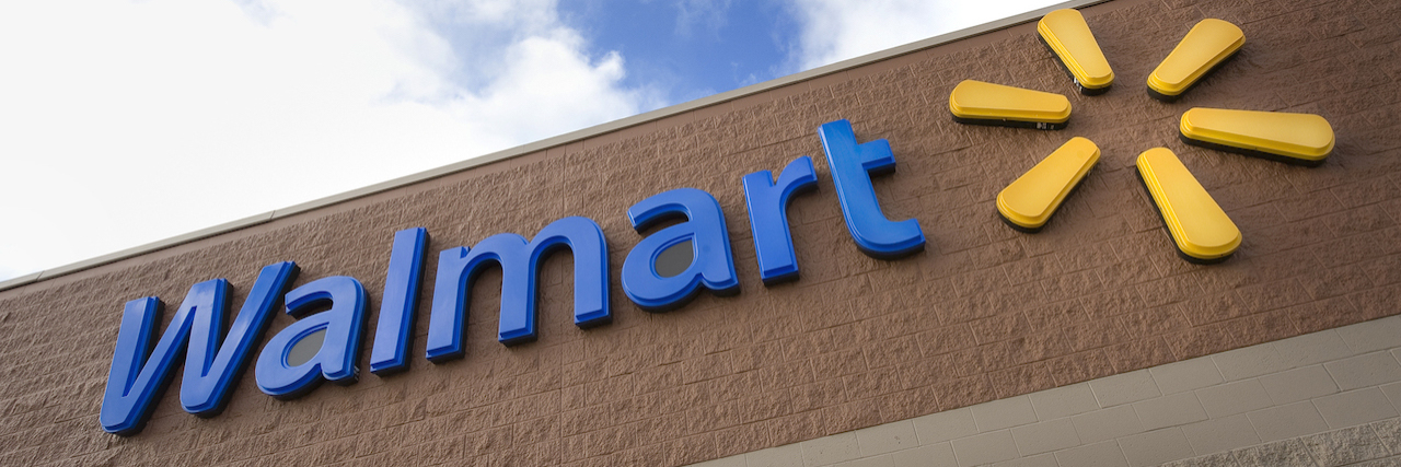 Disabled Walmart Employee Awarded $5.2 Million in Discrimination Suit Walmart sign view from the ground