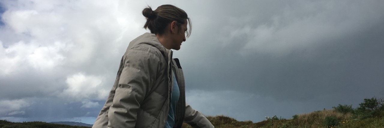 Encephalitis and anxiety Person sitting on a fence