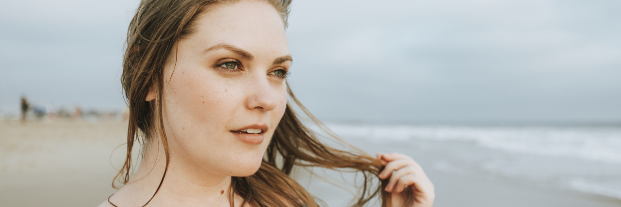 How My Father Helped Me Realize I Had Disorganized Schizophrenia women with brown hair at the beach looking off into the distance