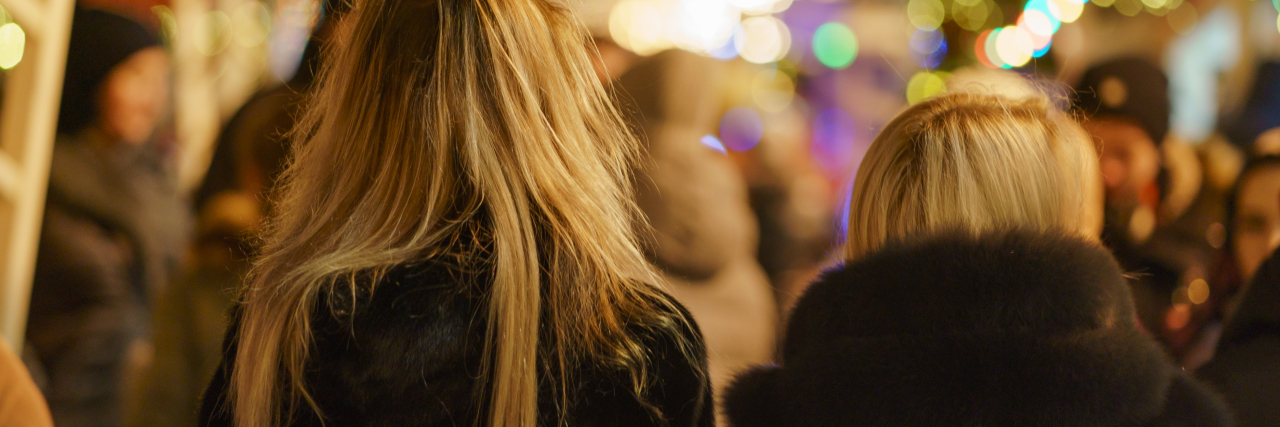 A Reminder About Holiday Socializing and Disabled Community holiday crowd blurred