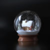 Snow globe with a cottage.