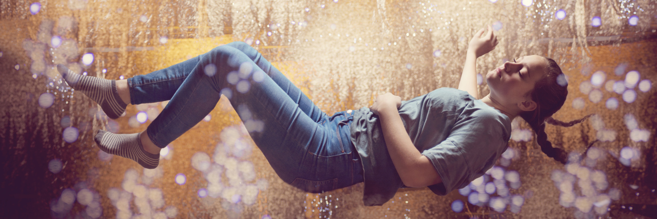 Explaining How It Feels to Have an Undiagnosed Chronic Illness Woman falling through space.