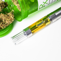 Medical marijuana buds and vape cartridge.