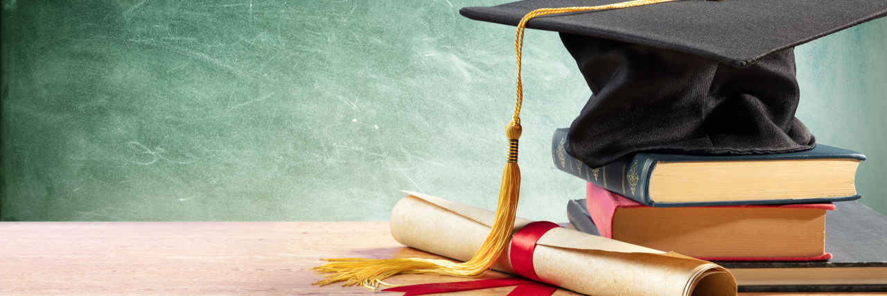 Mississippi's Diploma Standards for Students With Disabilities graduation cap and diploma on a table